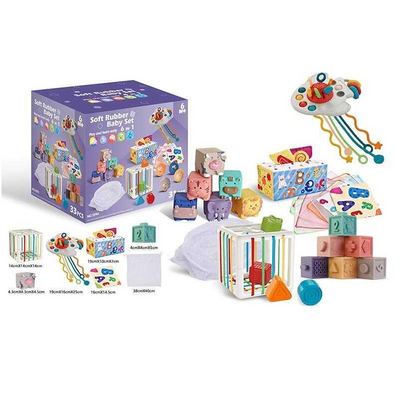 Набір для розвитку 1293 - 33 елементи, кубики, брязкальця, прорізувачі, серветки, мішечок, куб із формами