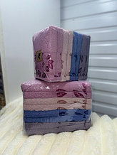 Рушник лицьовий матеріал махра розмір 50х90 мікс кольору в пакованні від 8 шт.