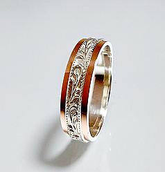 Срібна обручка з золотими накладками