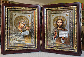 Ікони Пари Спаситель П.Б.Казанська в дерев'яному фігурному кіоті під склом, розмір 39*29, сюжет під срібло 20×30