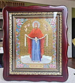 Ікона Пресвята Богородиця Покров у темному фігурному кіоті під склом, розмір кіота 32×28, сюжет 20×24.