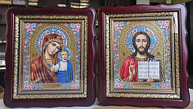 Ікони вінчальні Спаситель, П.Б.Казанська у темному дерев'яному кіоті під склом, розмір кіота 26*23, сюжет 15*18.