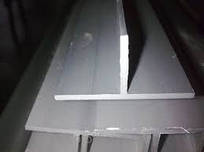 Тавр алюмінієвий 80х50х2х6000 мм АД 31 Т5 ціна купити порізування