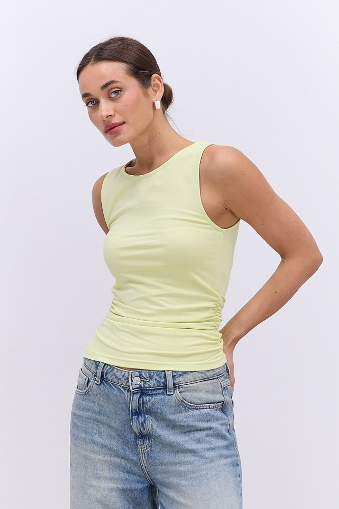Жіноча безрукавка з гумкою в бічних швах у різних кольорах, фото 1