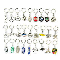 Компактний металевий брелок із логотипом автомобільних марок Моделі в асортименті