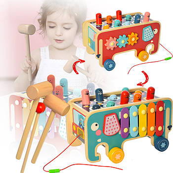 Дерев'яна каталка-бізіборд у вигляді слоника з ксилофоном і стукачками MD 2750 Іграшка, що розвиває.