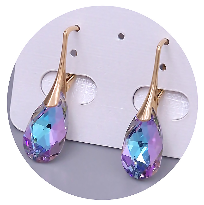 Сережки XР. Позолота 18К. Камені: Swarovski синьо-бузкового кольору. Довжина: 30 мм. Ширина: 9 мм.