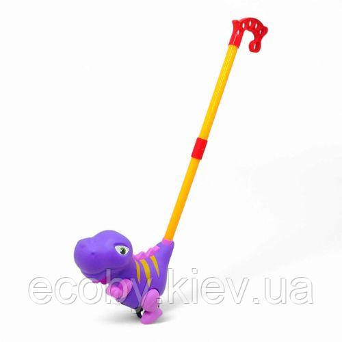 Каталка дитяча "Динозавр", з ручкою (фіолетовий), фото 1