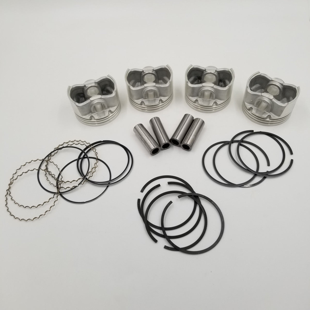 Поршні Ланос 1.5 76,5 мм (стандарт, комплект із пальцями та кільцями) SWP Корея 96143171, 96350120