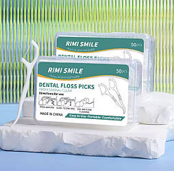 Зубна нитка (флоси) та зубочистка в пластиковому контейнері 50 шт.