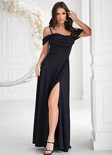 Сукня чорного кольору зі спущеними рукавами і драпіруванням у зоні декольте