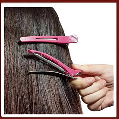 Зажими та фіксатори для волосся