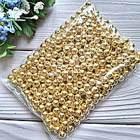 Намисто золоті 8 мм. Вага паковання 100 г приблизно 400 шт.