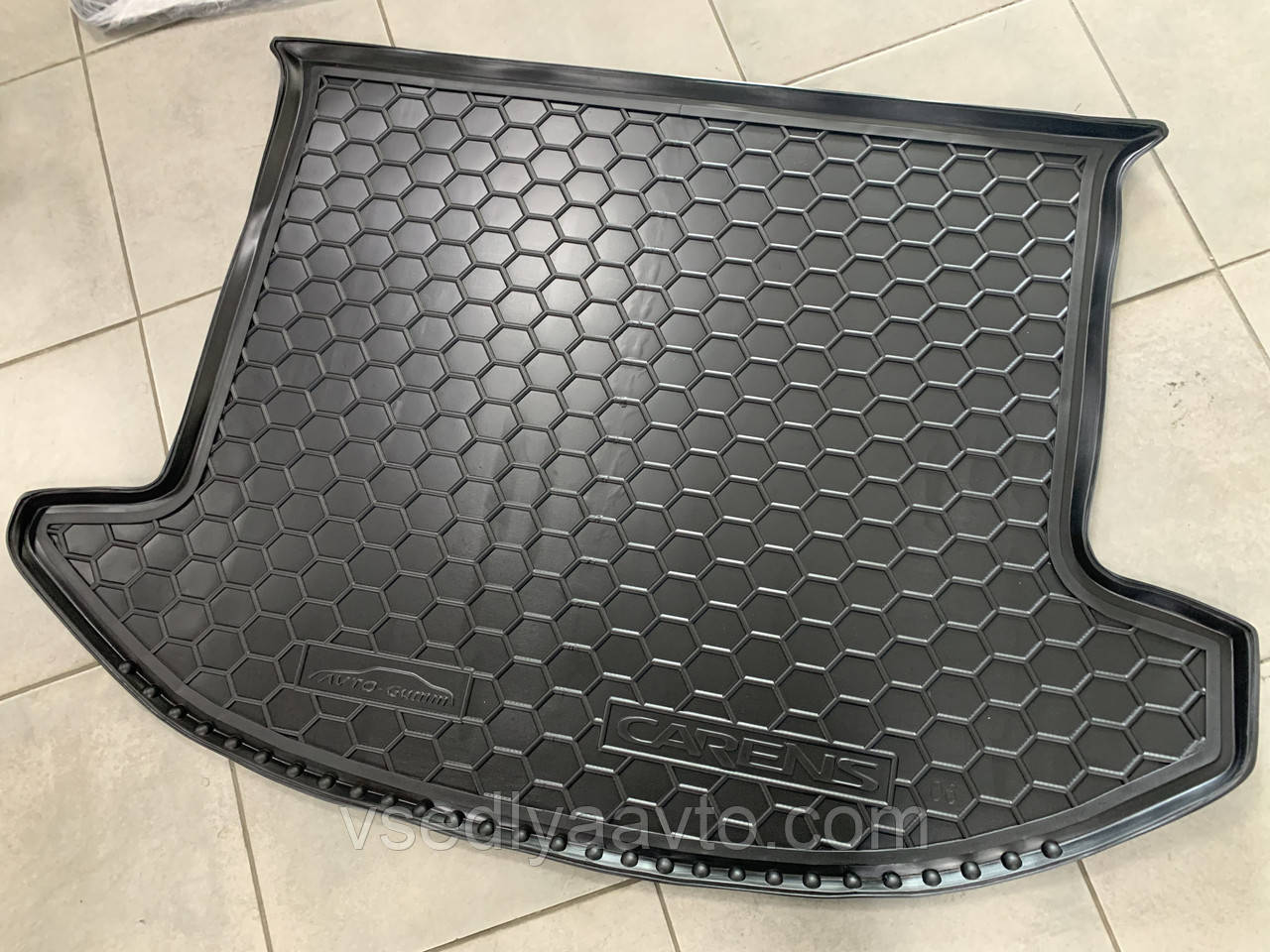 Килимок в багажник KIA Carens з 2006-2013 рр .. 5 місць (AVTO-GUMM) пластік+гума, фото 1