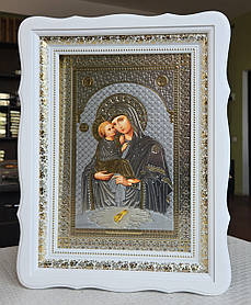 Ікона Пресвята Богородиця Почаївська в білому дерев'яному фігурному кіоті під склом, розмір кіота 39*29, сюжет 20*30.