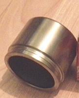 Поршень переднього гальмівного супорта, оригінал 47731-33340