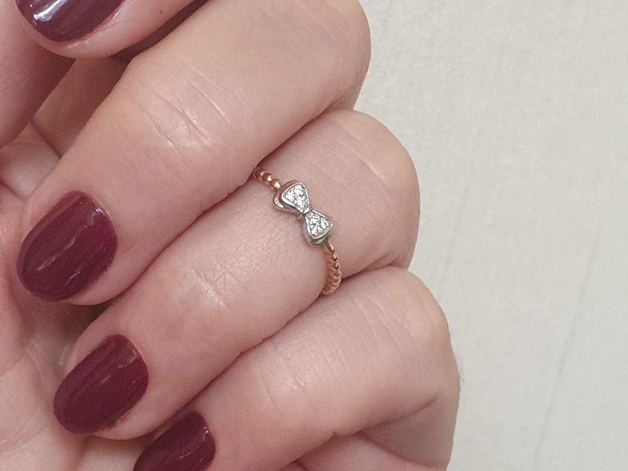 Золоте кільце Бантик з фіанітами. 700270 15,5