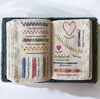 Книга з вишивки, текстильна книга на 10 сторінок на 106 видів стібків