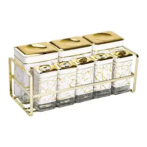 Набір із 8 ємностей для зберігання приправ і спецій по 650/150 мл на металевій підставці білий