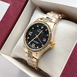 Металевий жіночий наручний годинник Rolex (ролекс) золотистий з чорним, камінчики навколо, дата - код 2528b, фото 4