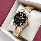 Металевий жіночий наручний годинник Rolex (ролекс) золотистий з чорним, камінчики навколо, дата - код 2532b, фото 4