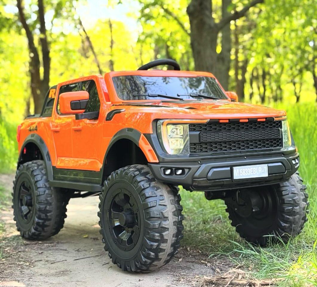 Дитячий електромобіль на акумуляторі Джип Ford M 5833 з пультом радіокерування для дітей 3-8 років Жовтогарячий