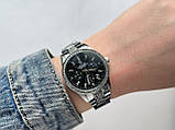Металевий жіночий наручний годинник Rolex (ролекс) сріблястий з чорним, камінчики навколо, дата - код 2535b, фото 3