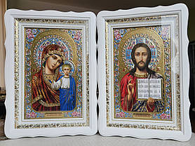 Ікони пара Спаситель П.Б.Казанська в білому деревянному кіоті під склом,  розмір кіота 39*29, сюжет з квітами