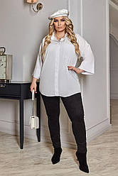 Елегантна блузка в класичному стилі вільного крою з широкими укороченими рукавами