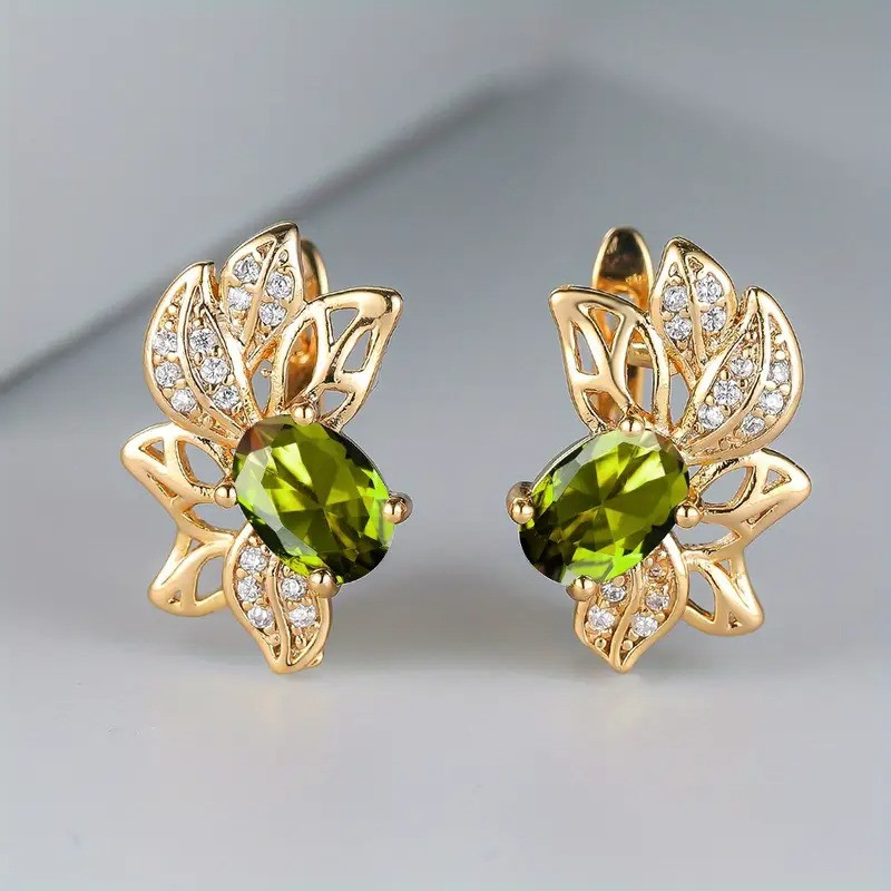 Золотаві сережки з салатовим каменем овальна огранка порожні листя для дівчат 1.8 см, фото 1