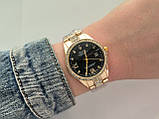 Металевий жіночий наручний годинник Rolex (ролекс) золотистий з чорним, камінчики навколо, дата - код 2528b, фото 3