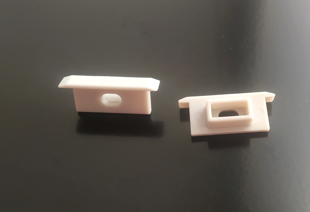 Заглушка LT для алюмінієвого профілю накладного LT-617 10х24мм з отвором 52014