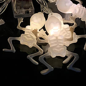 Гірлянда у вигляді скелетів RESTEQ 1.5 м — гірлянда на Гелловін з 10 фігурками, тепле біле світло, на батарейках