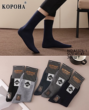 Чоловічі шкарпетки матеріал бавовна розмір 41-47 колір показаний на зображенні в пакованні від 12 шт.