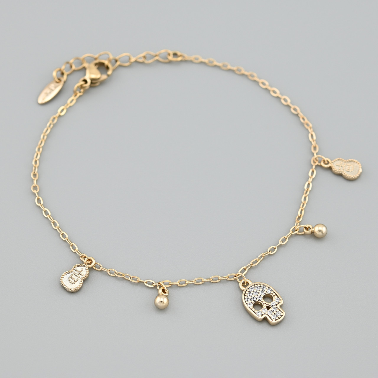 Браслет Череп 53855 ширина 1.5 мм білі фіаніти позолота 18К довжина 17+3, фото 1