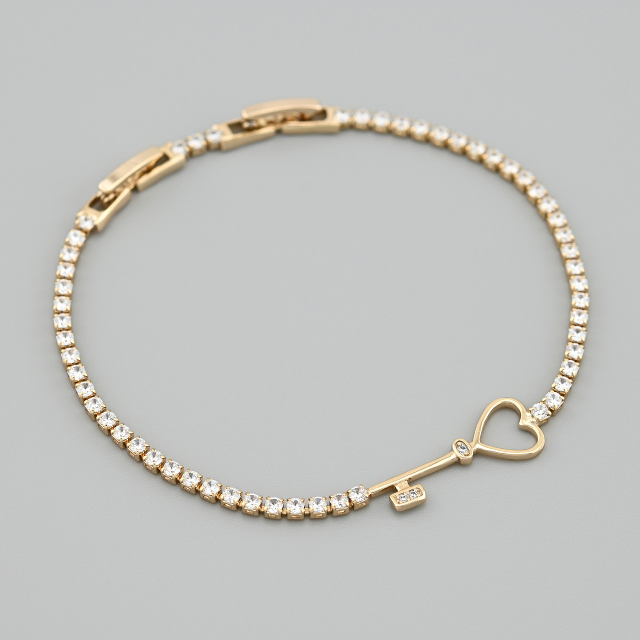 Браслет Love key 53374 ширина 2 мм білі фіаніти позолота 18К довжина 19