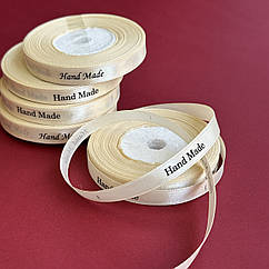 Стрічка атласна молочна з тисненням "Hand Made", 0,9 см