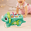 Розвивальна іграшка 5 в 1 динозавр Дитяча гра стукачка каталка магнітна рибалка пальчикові ігри 2 кольори, фото 4