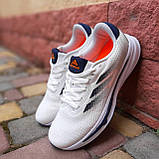 Літні текстильні Чоловічі кросівки Adidas Supernova Stride білі з синім та помаранчевим, фото 3