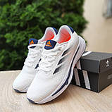 Літні текстильні Чоловічі кросівки Adidas Supernova Stride білі з синім та помаранчевим, фото 7
