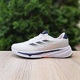 Літні текстильні Чоловічі кросівки Adidas Supernova Stride білі з синім та помаранчевим, фото 8