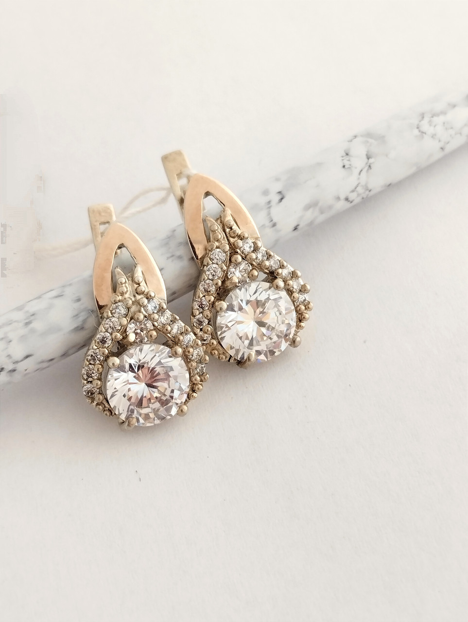 Срібні сережки з золотими пластинами