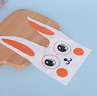 Пакети з малюнком Зайчик помаранчевий Велетні 36х21 см набір 10 шт подарункові дитячі з вушками зав'язками