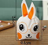 Пакети з малюнком Зайчик помаранчевий Велетні 36х21 см набір 10 шт подарункові дитячі з вушками зав'язками, фото 4