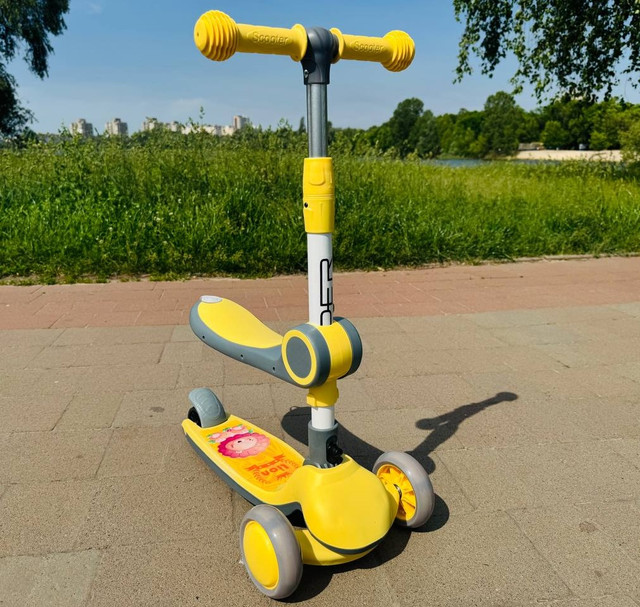 Дитячий самокат із сидінням