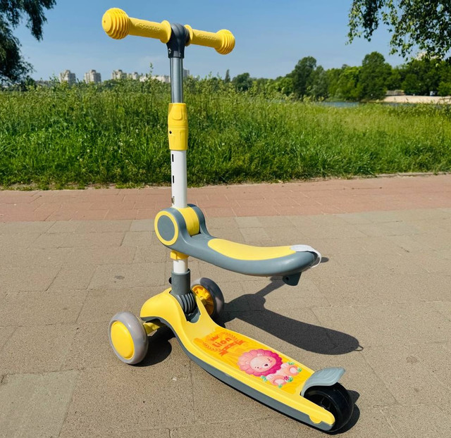 Дитячий самокат з регульованою ручкою