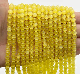 Намистини Котяче око / Ø 6 мм / Нитка ≈ 58 намистин / Світло Жовтий