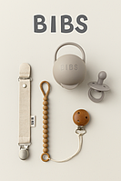 Тримачі та контейнери для сосок