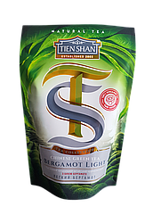 Зелений китайський крупнолистовий чай з олією бергамоту Тянь Шань Легкий бергамот 80 грамів