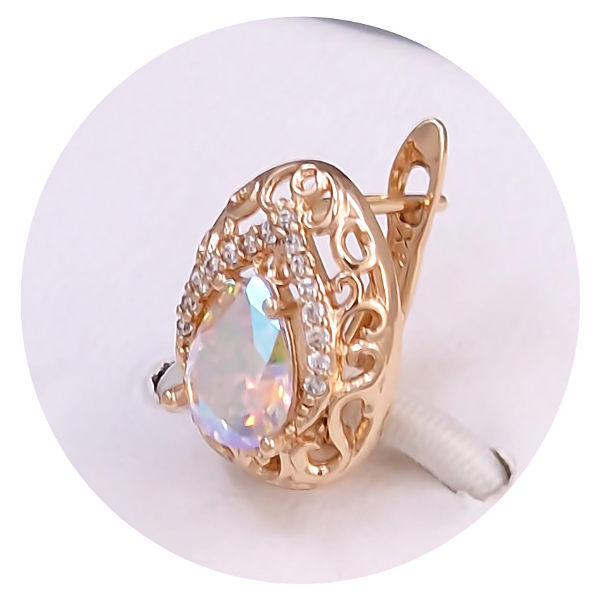 Сережки XР. Позолота 18К. Камені: Swarovski бензинового кольору та циркон. Довжина: 15 мм. Ширина: 12 мм.